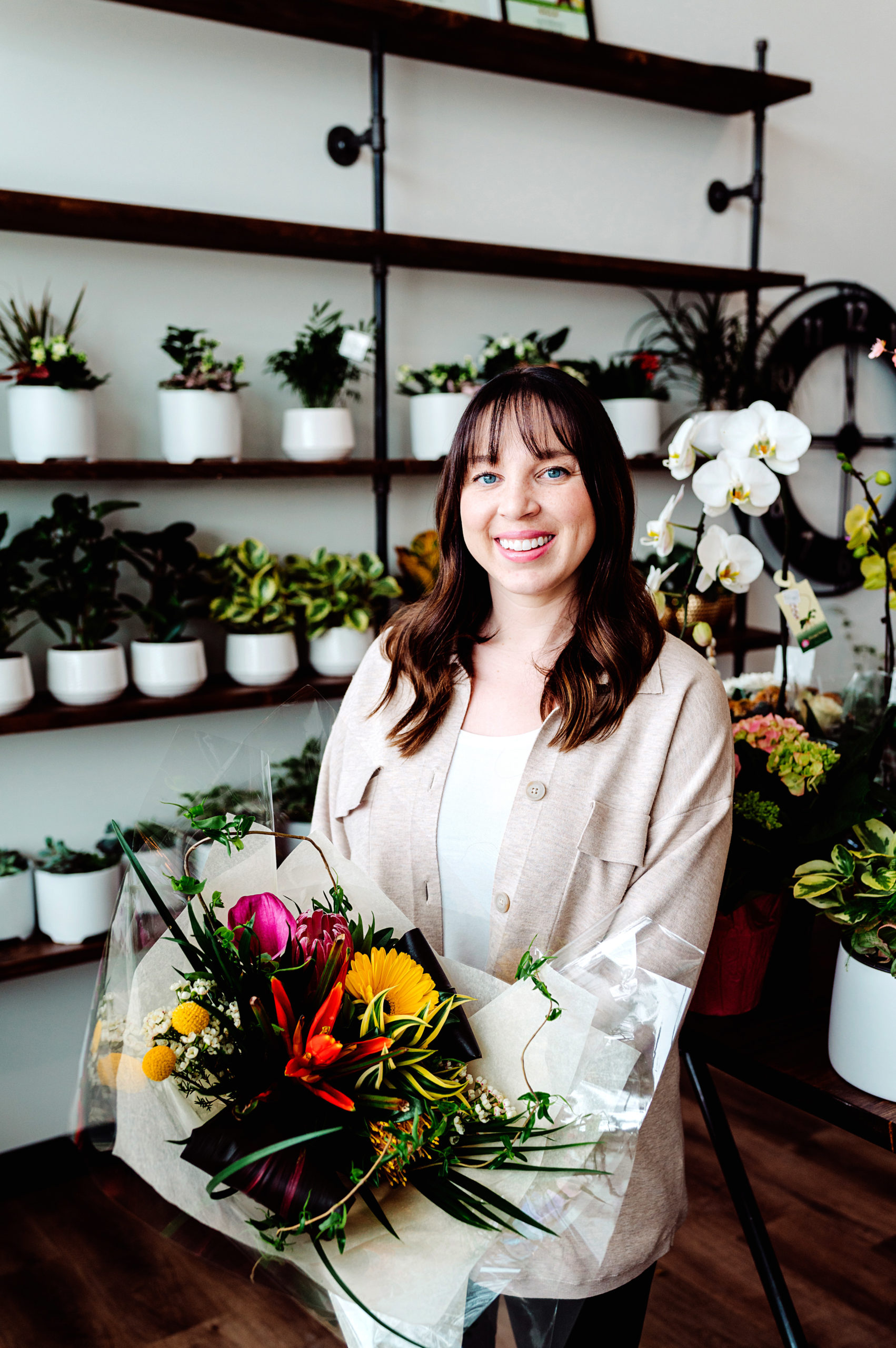 Kathryn Rosgen holds a bouquet of flowers